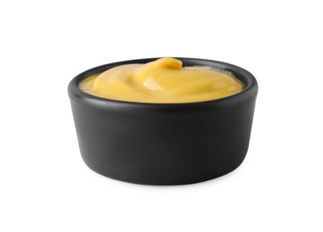 Photo of Bowl with delicious mustard on white background