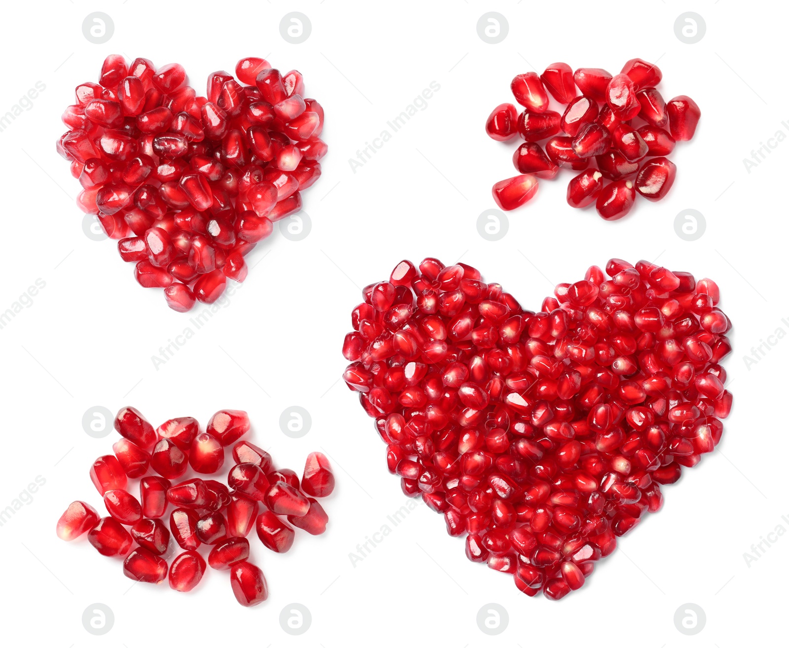 Image of Set with ripe juicy pomegranate seeds on white background, top view 