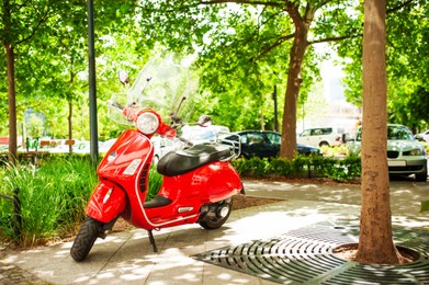 Photo of Beautiful red motorcycle on sunny day outdoors