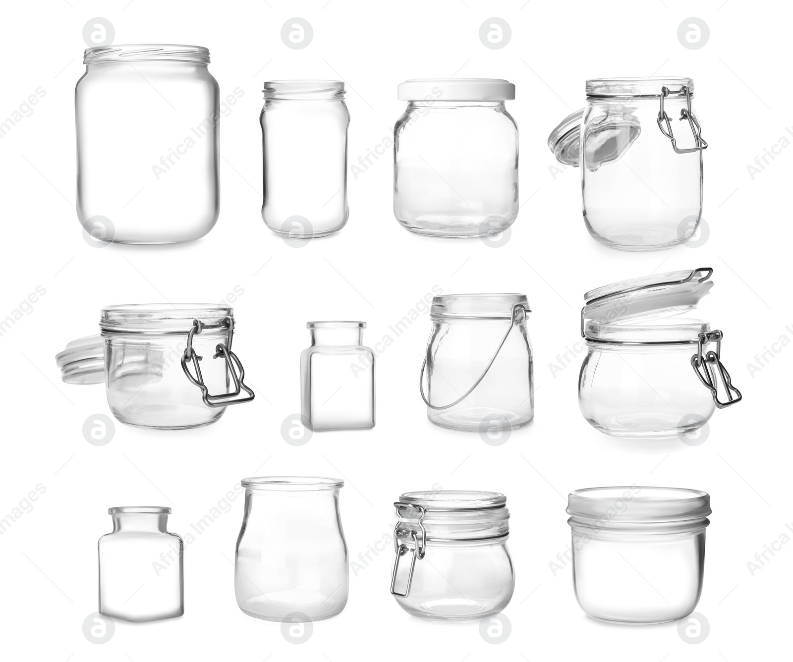 Image of Set with different empty glass jars on white background