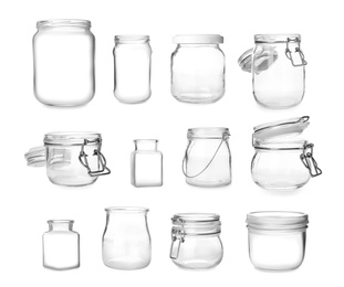 Set with different empty glass jars on white background