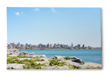 Photo printed on canvas, white background. Beautiful view of city near sea on sunny day