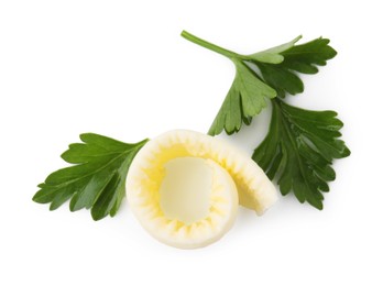 Photo of Tasty butter curl and fresh parsley isolated on white, top view
