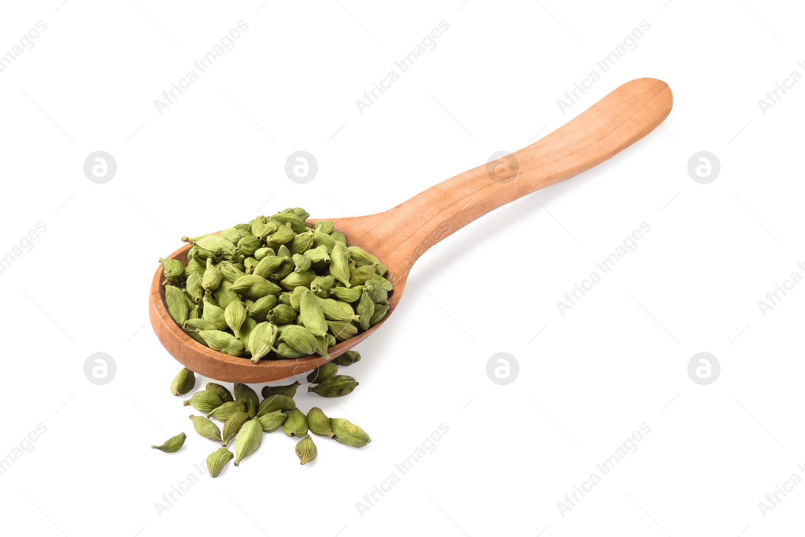 Photo of Wooden spoon with cardamom on white background