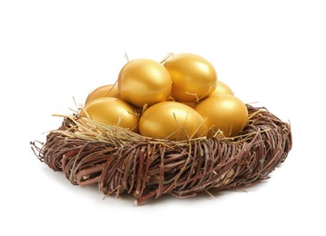 Shiny golden eggs in nest on white background