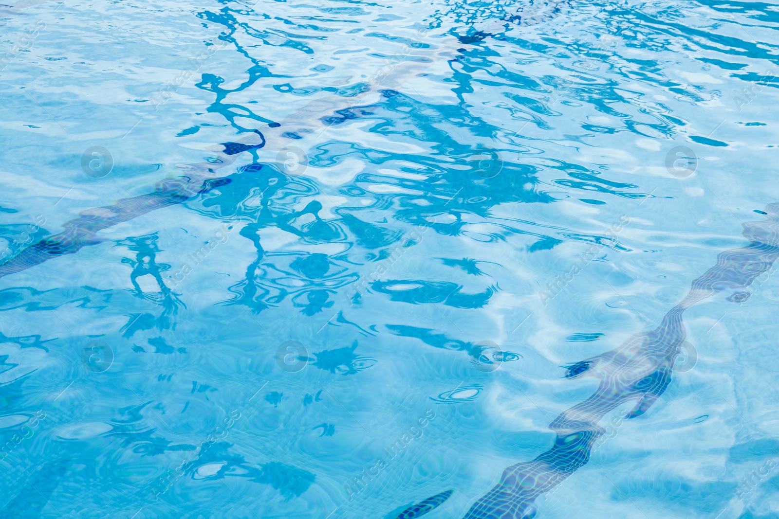 Photo of Outdoor swimming pool with clear rippled water