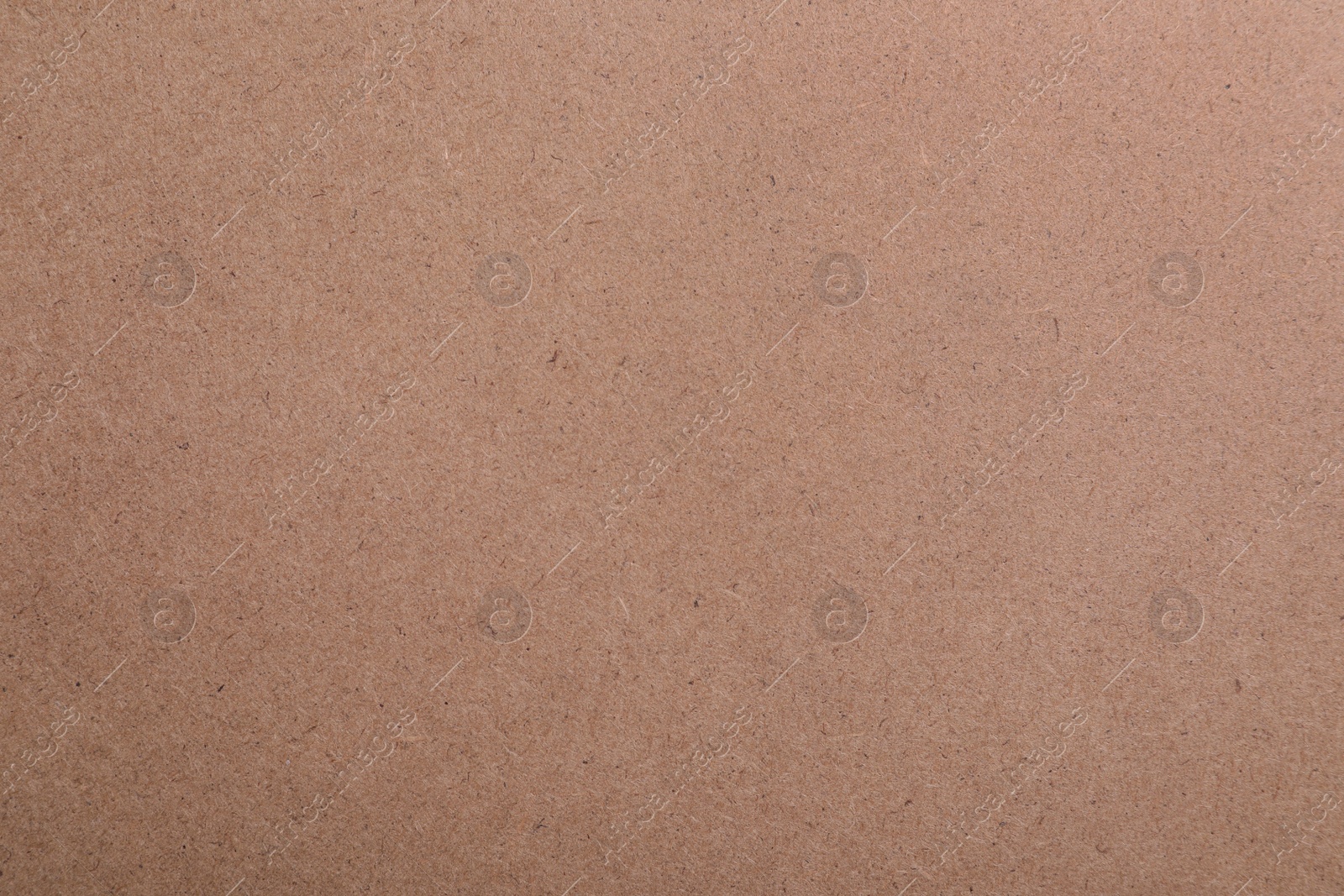 Photo of Texture of kraft paper bag as background, closeup