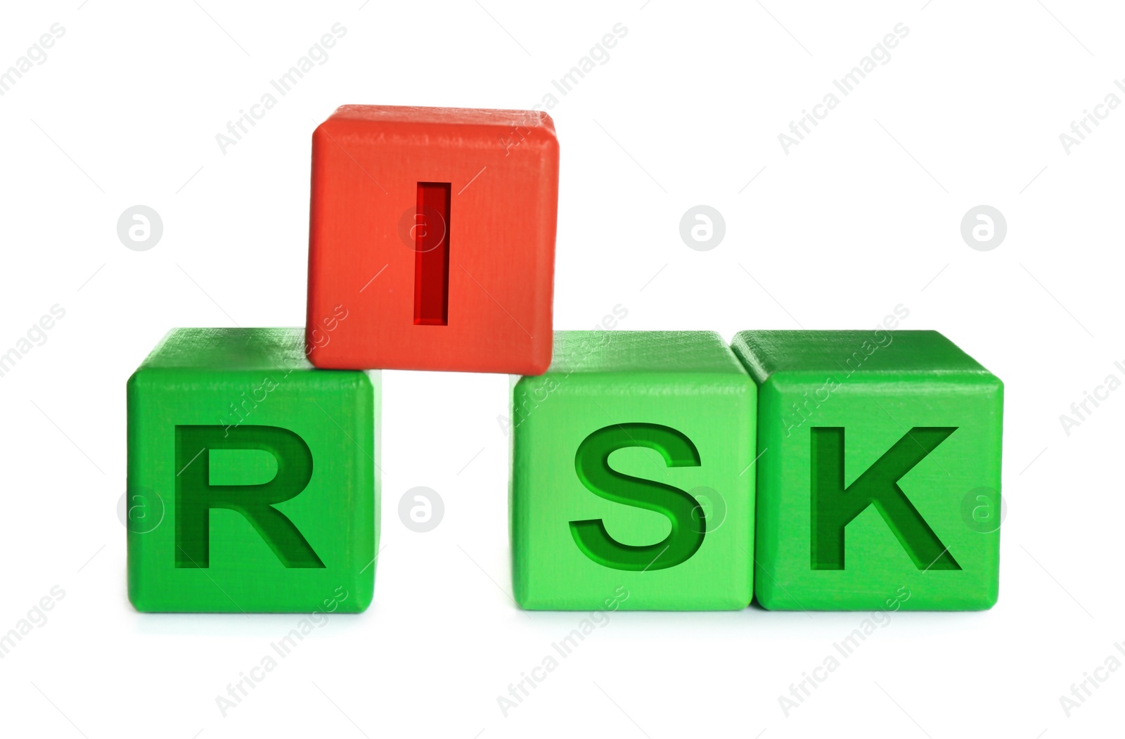 Photo of Color wooden cubes with word Risk isolated on white