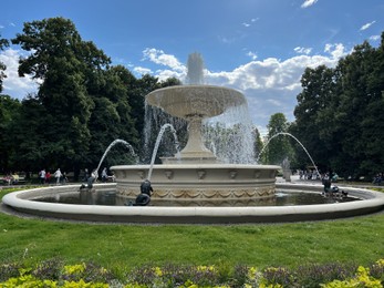 Photo of WARSAW, POLAND - JULY 17, 2022: Beautiful fountain in Saxon garden