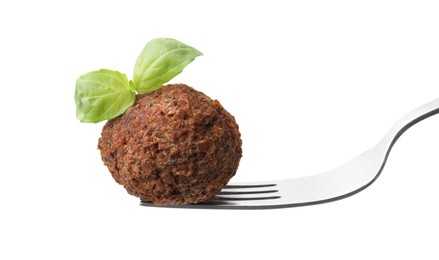 Photo of Delicious falafel ball, basil and fork isolated on white