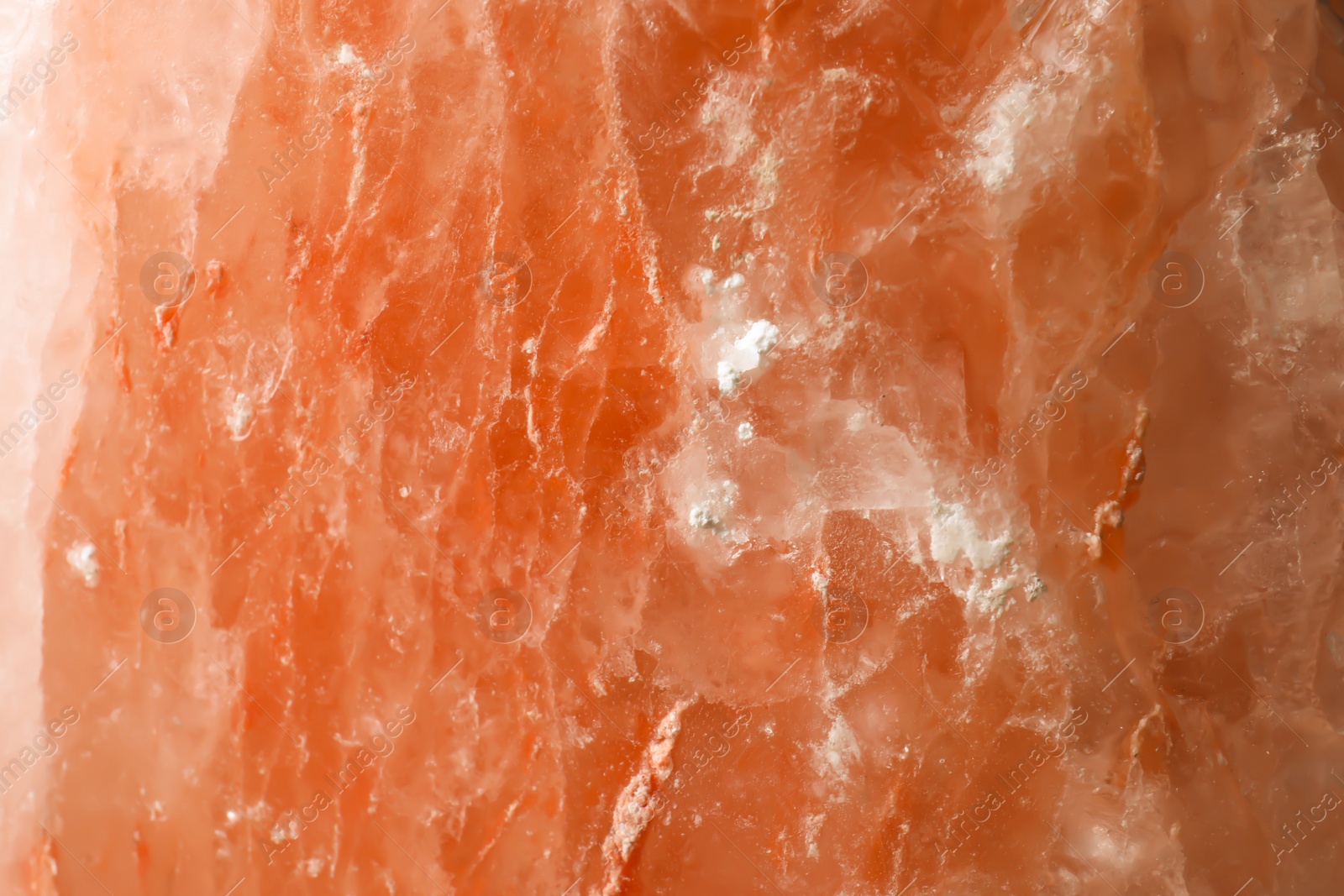 Photo of Orange Himalayan sea salt texture, closeup view