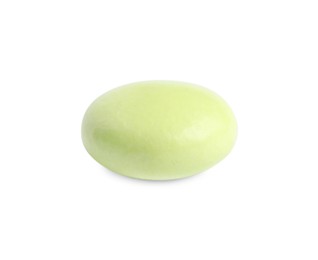 Photo of One light green pill isolated on white. Medicinal treatment