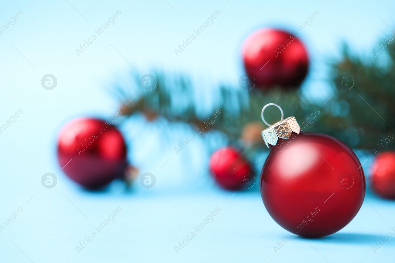 Photo of Beautiful Christmas ball on blurred background. Space for text