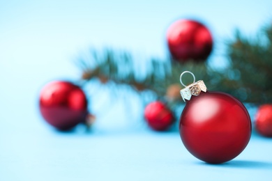 Beautiful Christmas ball on blurred background. Space for text