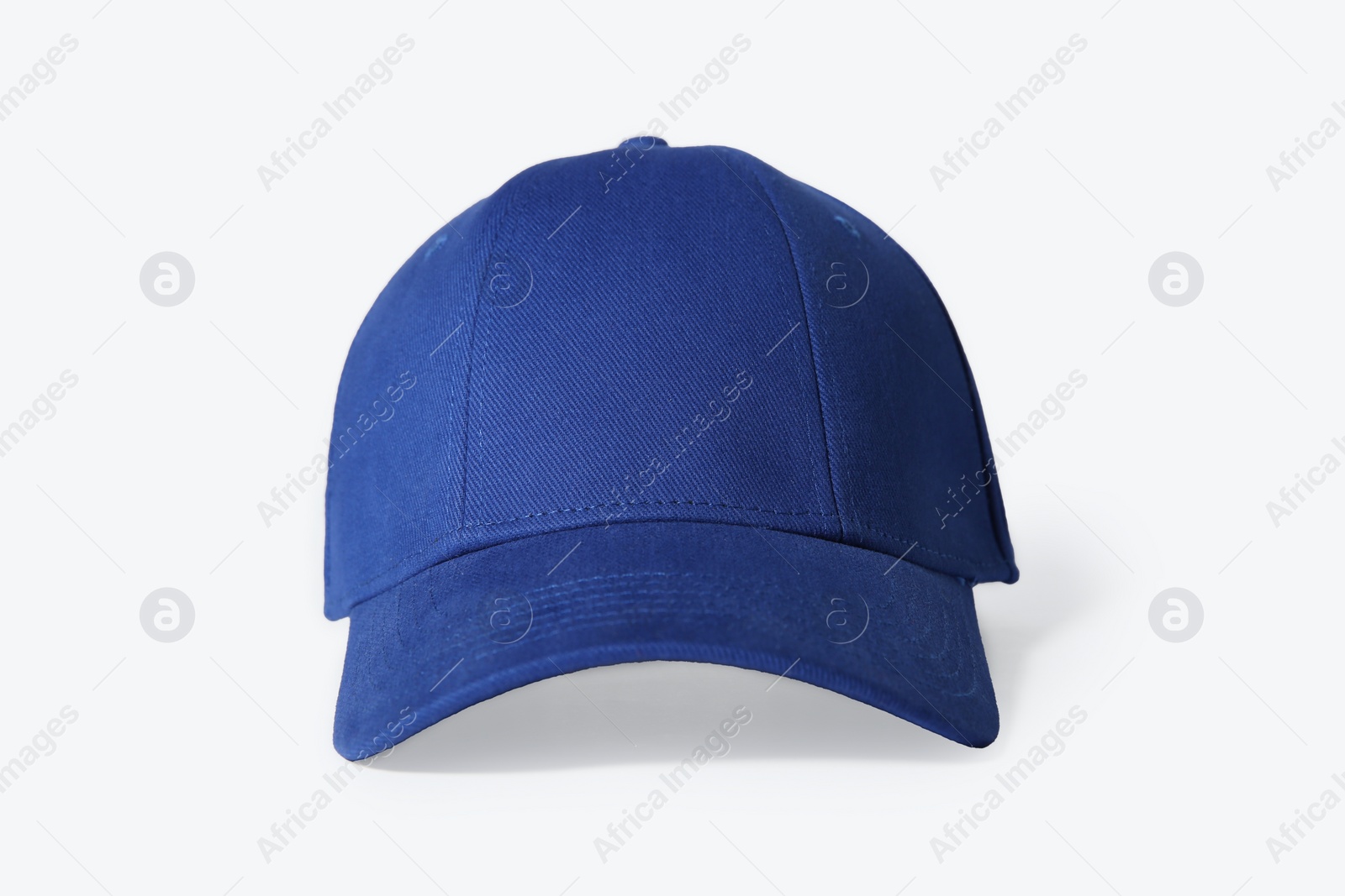 Photo of Stylish blue baseball cap on white background