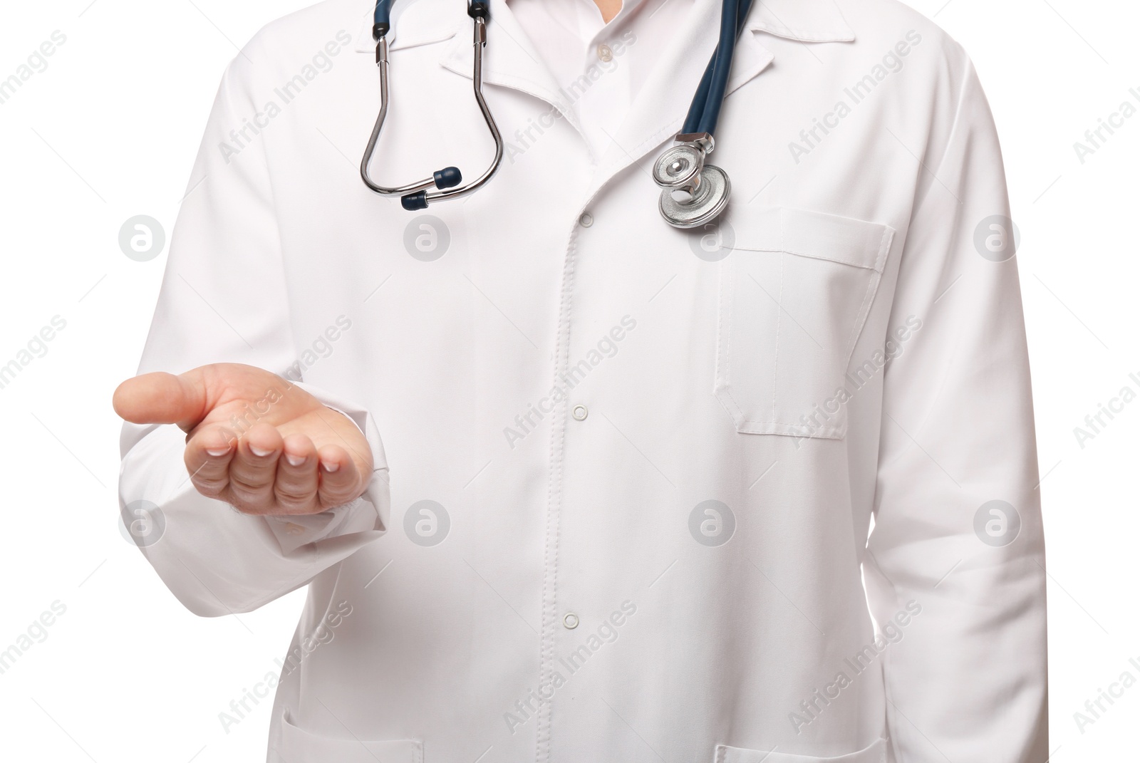 Photo of Doctor with stethoscope holding something on white background, closeup. Cardiology concept