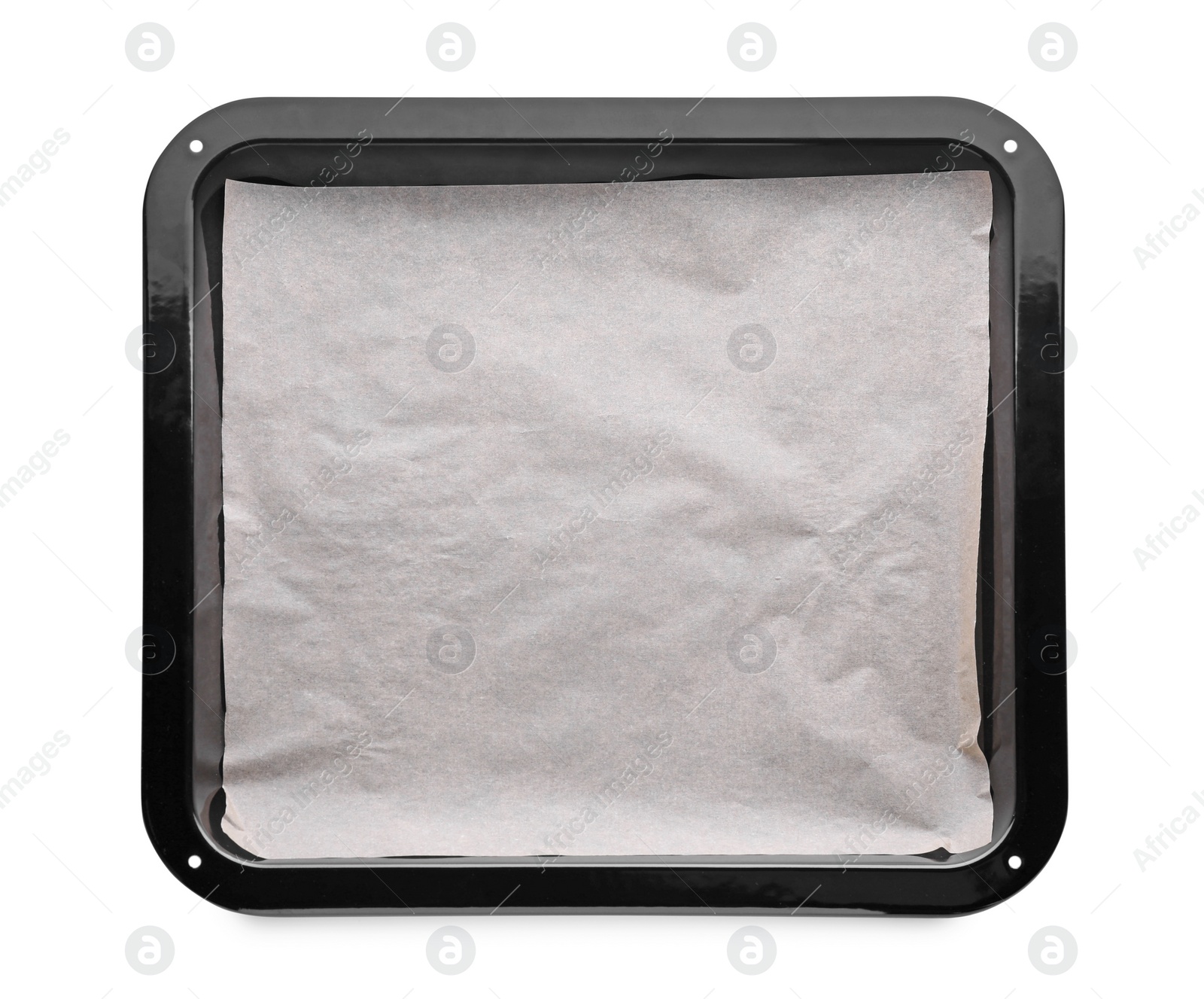 Photo of Baking pan with parchment paper isolated on white, top view