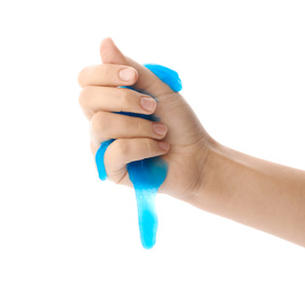 Woman playing with blue slime isolated on white, closeup. Antistress toy