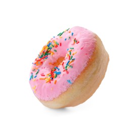 Photo of Tasty glazed donut decorated with sprinkles on white background