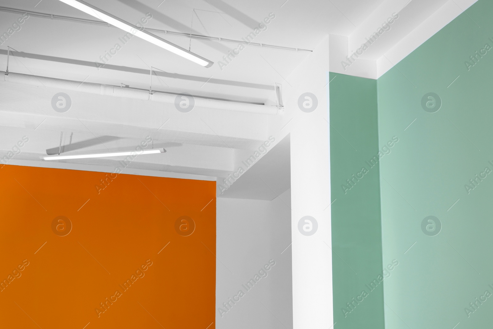 Photo of Empty renovated room with beautiful colorful walls