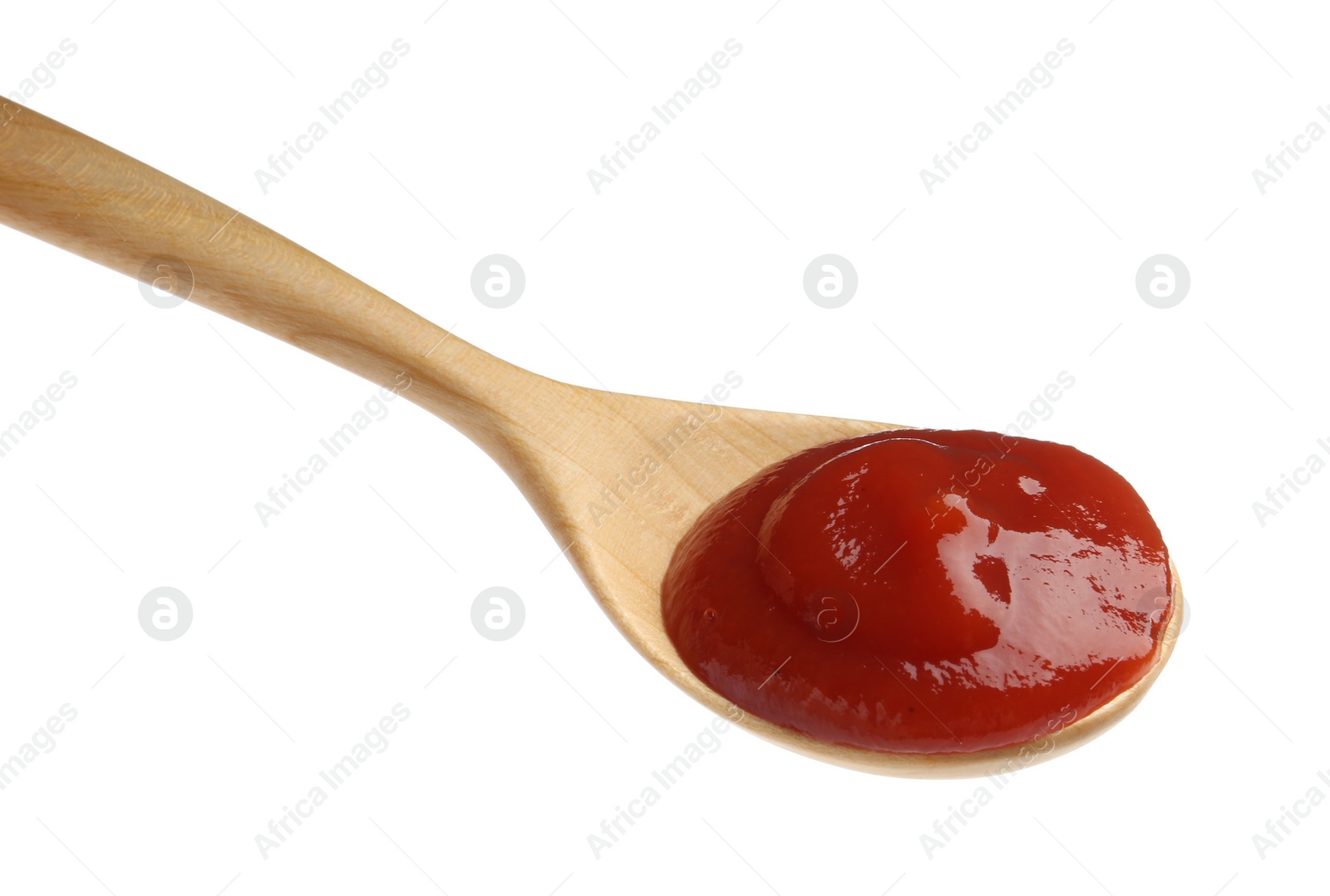 Photo of Tasty ketchup with spoon isolated on white. Tomato sauce