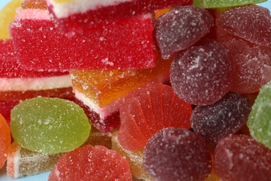 Photo of Delicious bright jelly candies as background, closeup