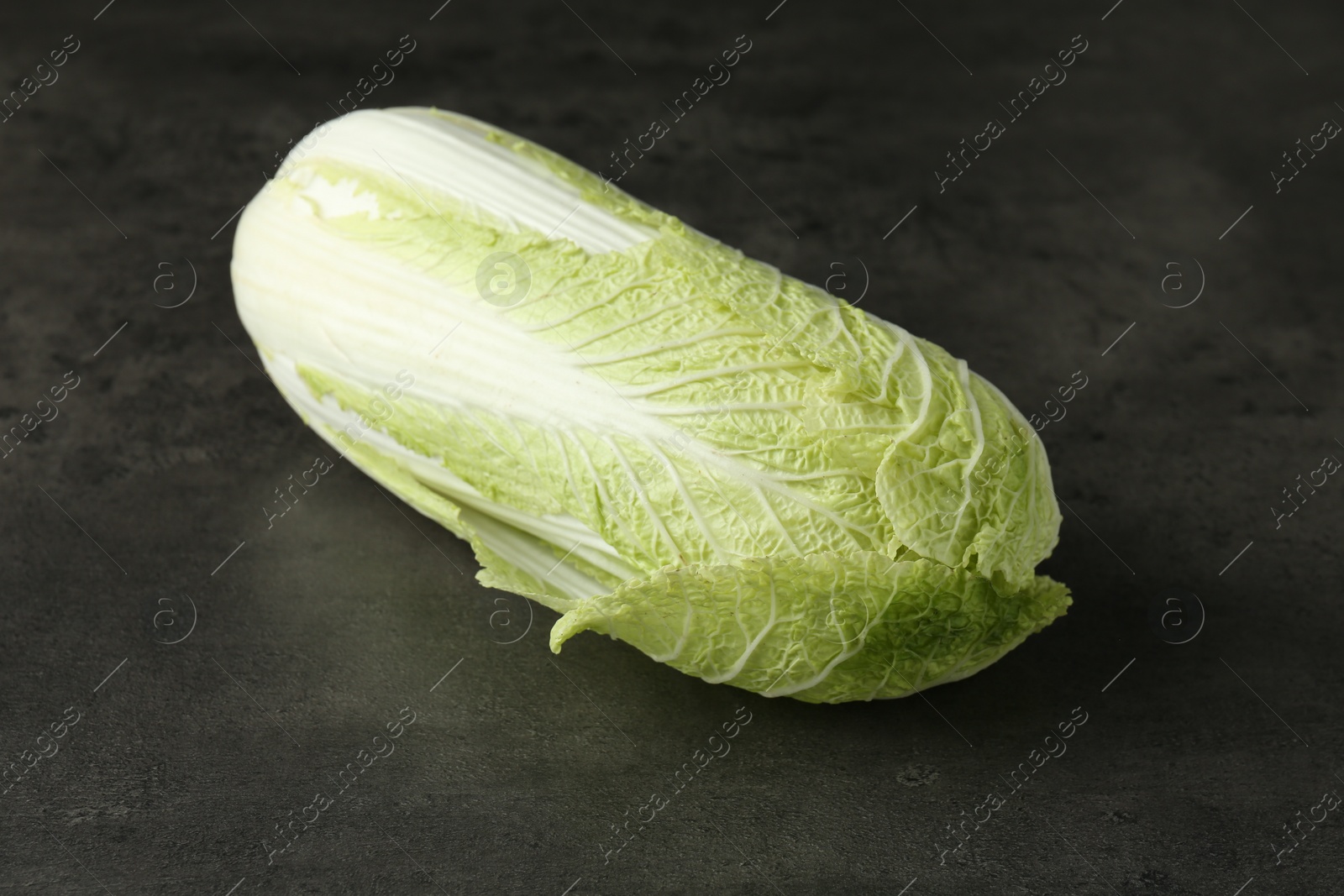 Photo of Fresh ripe Chinese cabbage on grey table