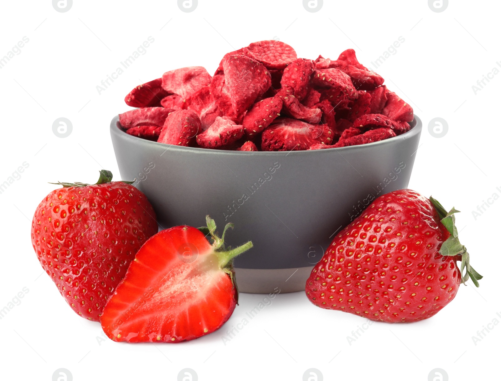 Photo of Sweet sublimated and fresh strawberries on white background