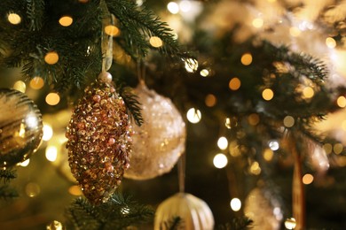 Photo of Closeup view of Christmas tree with beautiful decor