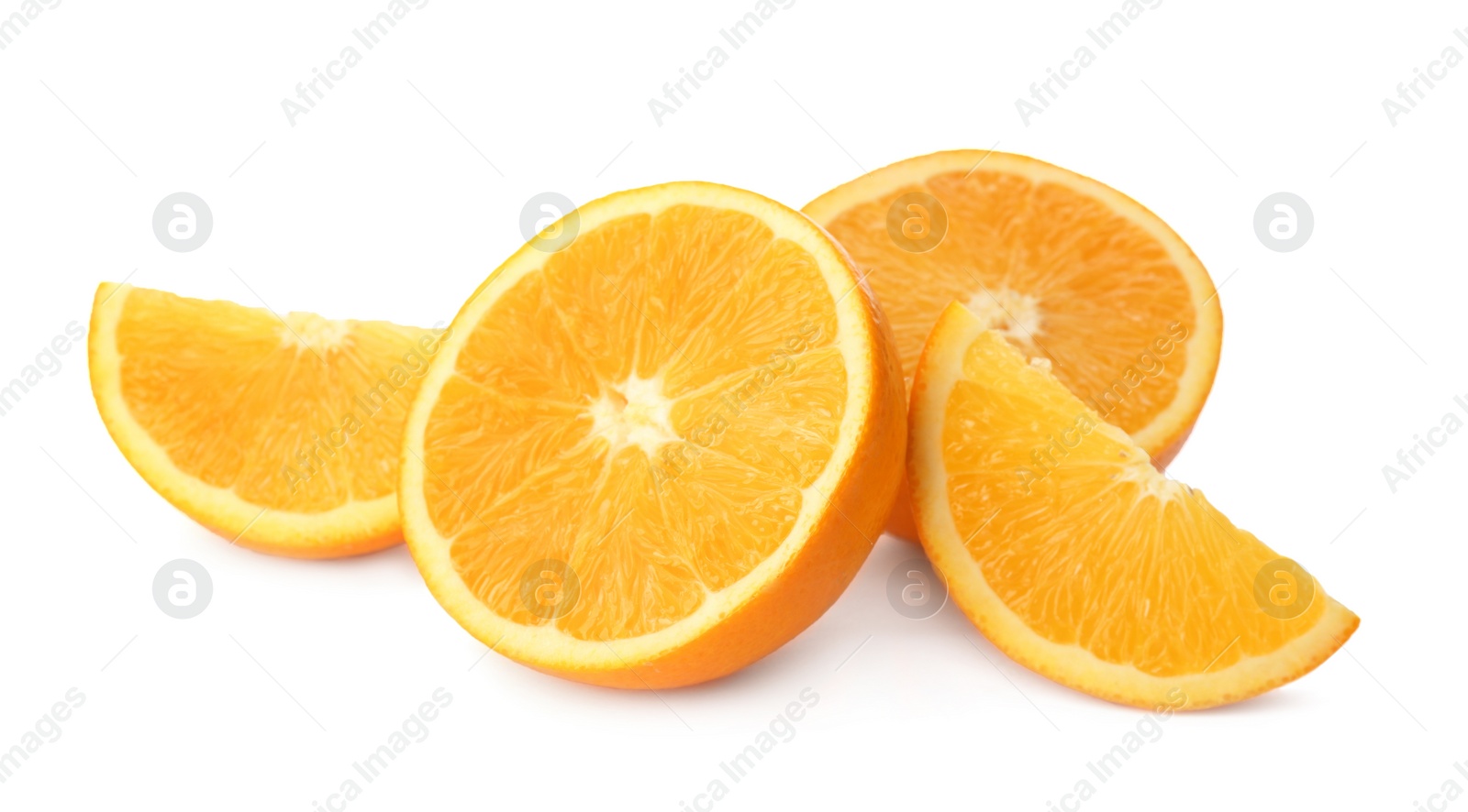 Photo of Cut fresh ripe oranges on white background