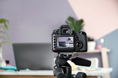 Photo of  blogger's workplace on camera screen, closeup with space for text