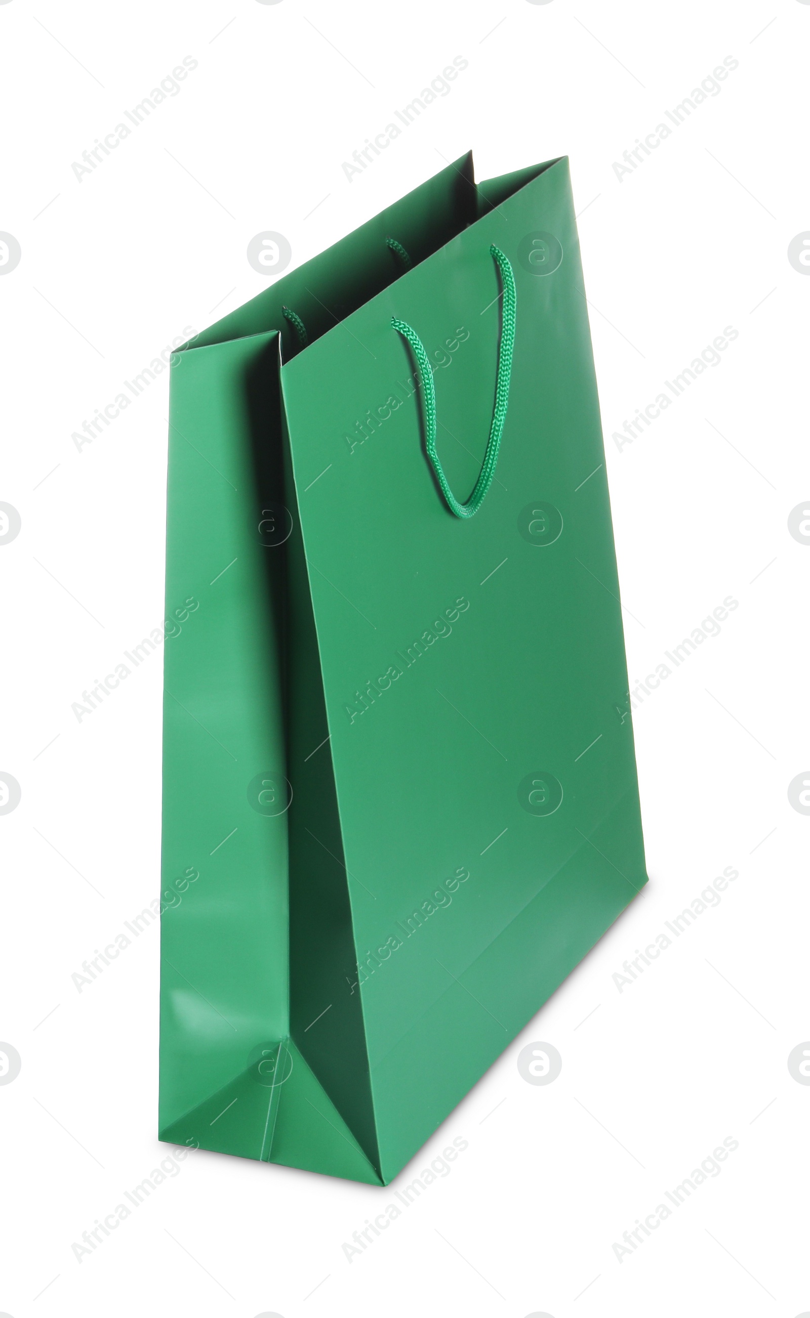 Photo of One green shopping bag isolated on white