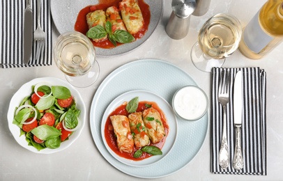 Tasty cabbage rolls served for dinner on table