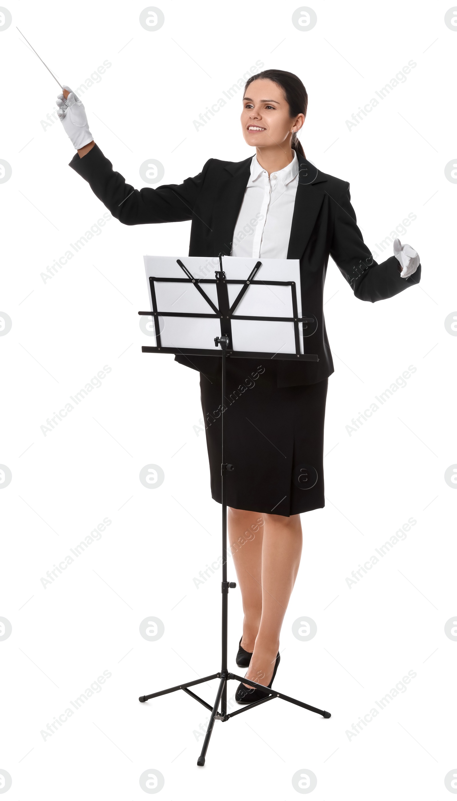 Photo of Happy young conductor with baton and note stand on white background