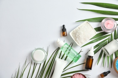 Flat lay composition with cosmetic products on white background