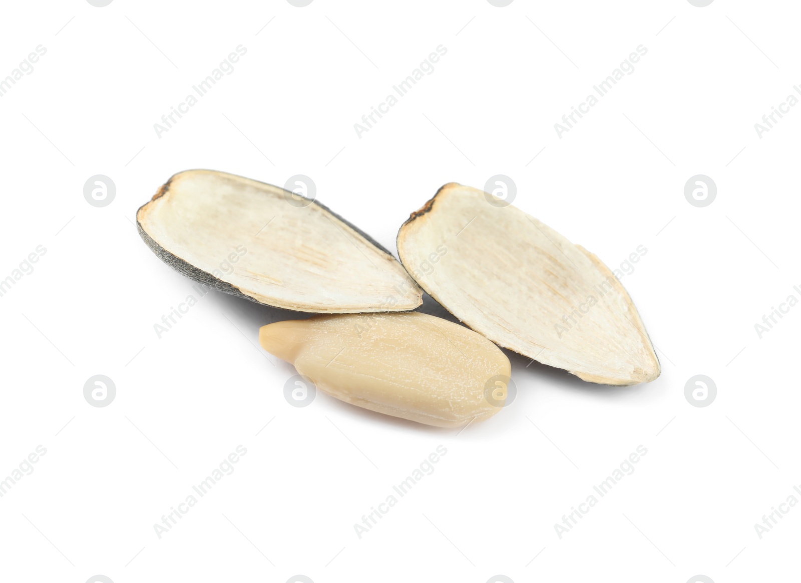 Photo of Raw peeled sunflower seed and shell isolated on white