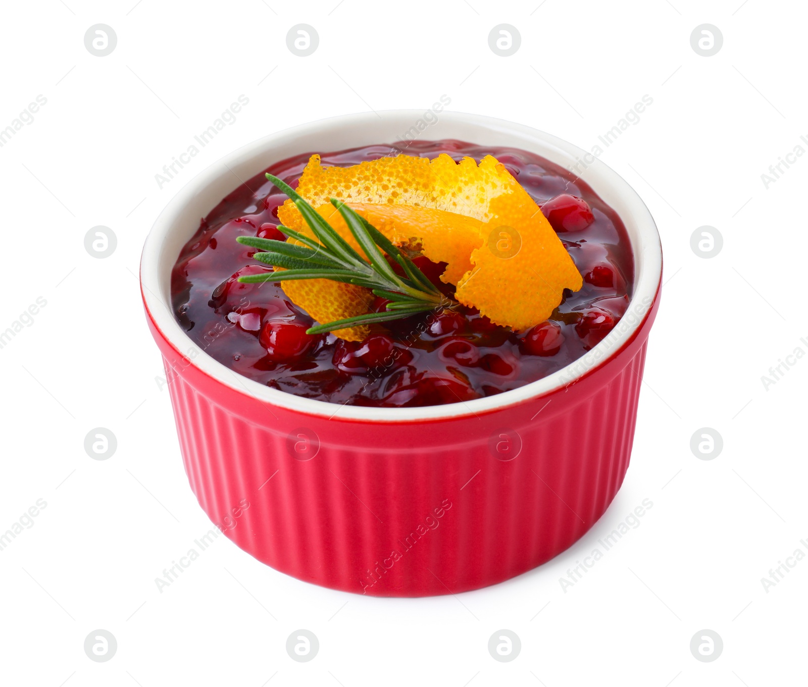 Photo of Fresh cranberry sauce in bowl, rosemary and orange peel isolated on white