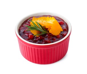 Fresh cranberry sauce in bowl, rosemary and orange peel isolated on white