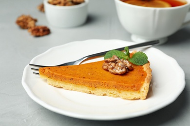 Image of Piece of fresh homemade pumpkin pie on table