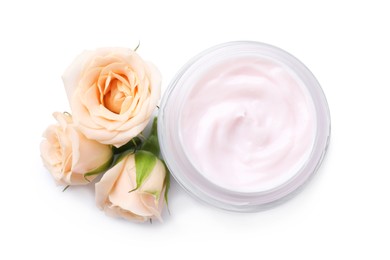 Photo of Jar of body cream with rose flowers on white background, top view