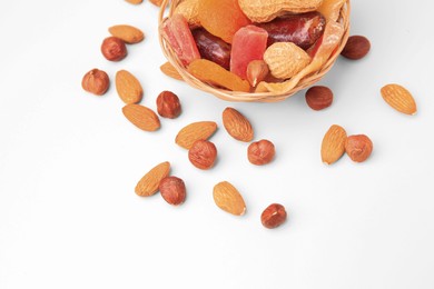 Mixed dried fruits and nuts on white background, above view