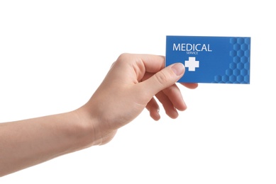 Photo of Woman holding business card isolated on white, closeup. Medical service
