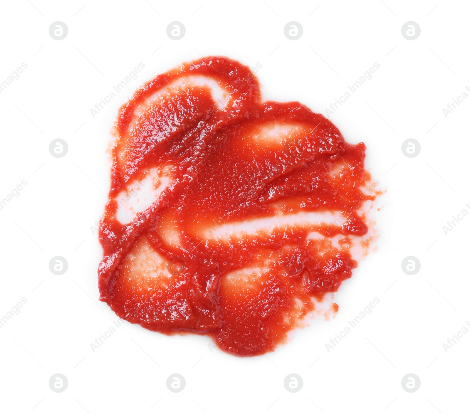 Photo of Tasty tomato paste isolated on white, top view