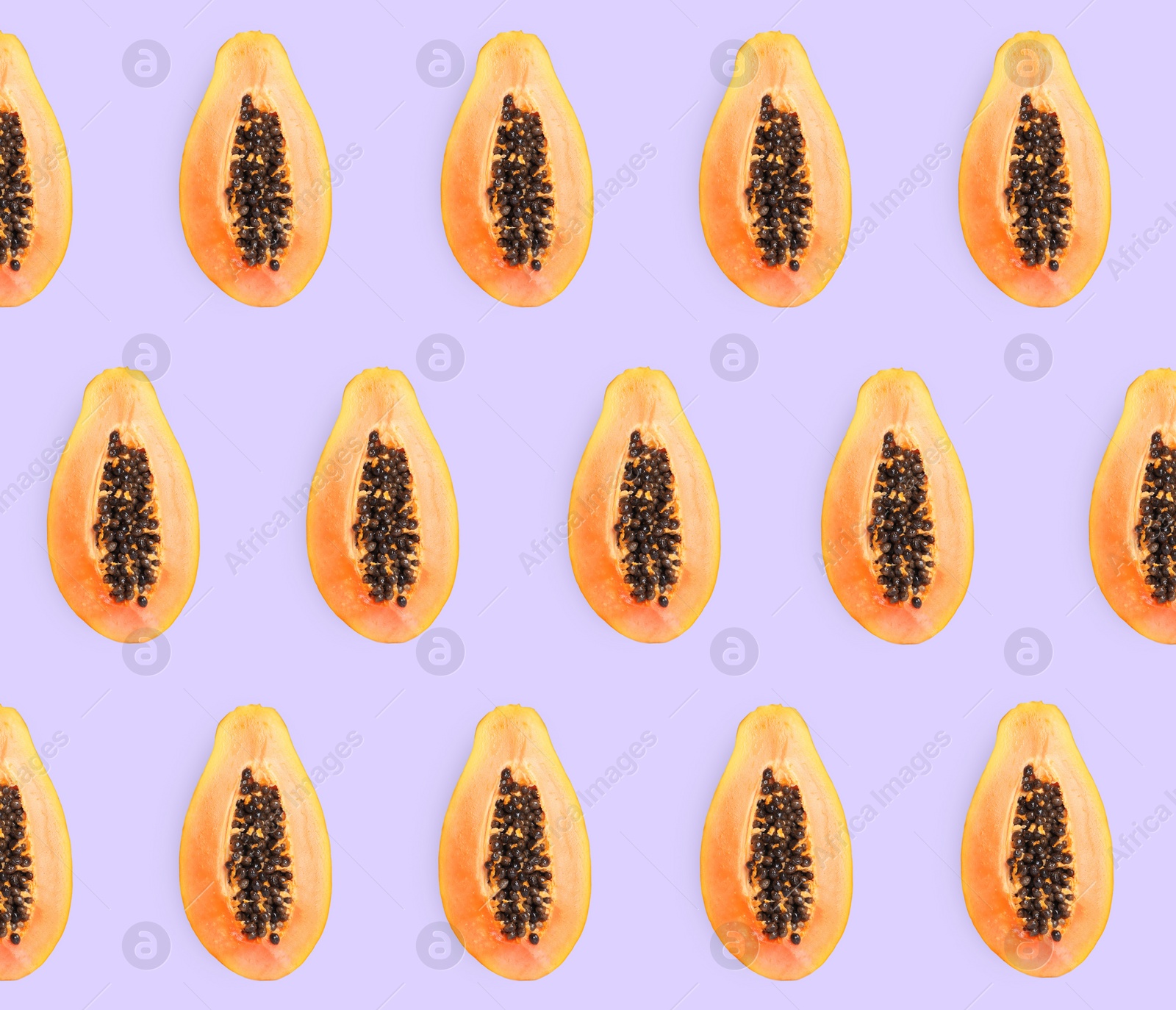 Image of Delicious cut papaya fruits on lilac background, flat lay