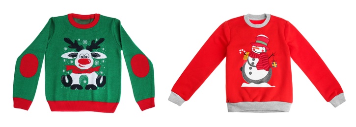 Red and green Christmas sweaters on white background