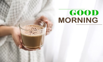 Good Morning! Woman with cup of hot drink near window at home, closeup