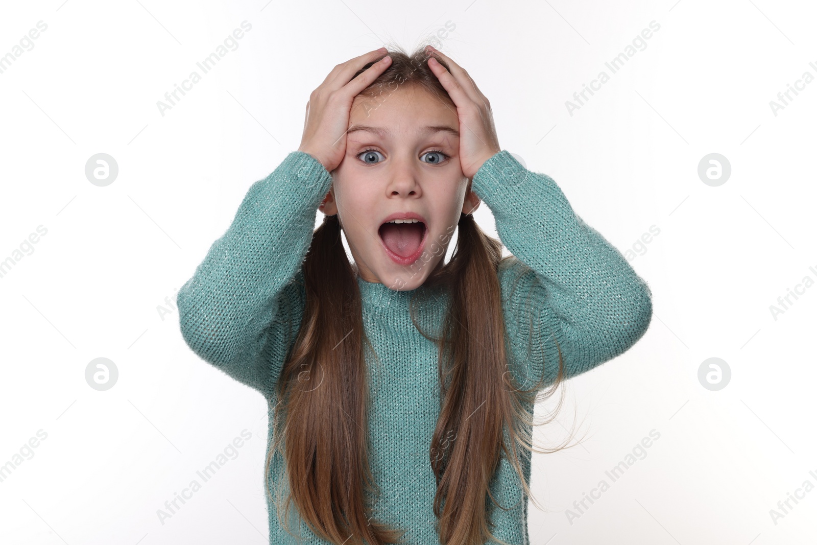 Photo of Portrait of surprised girl on white background