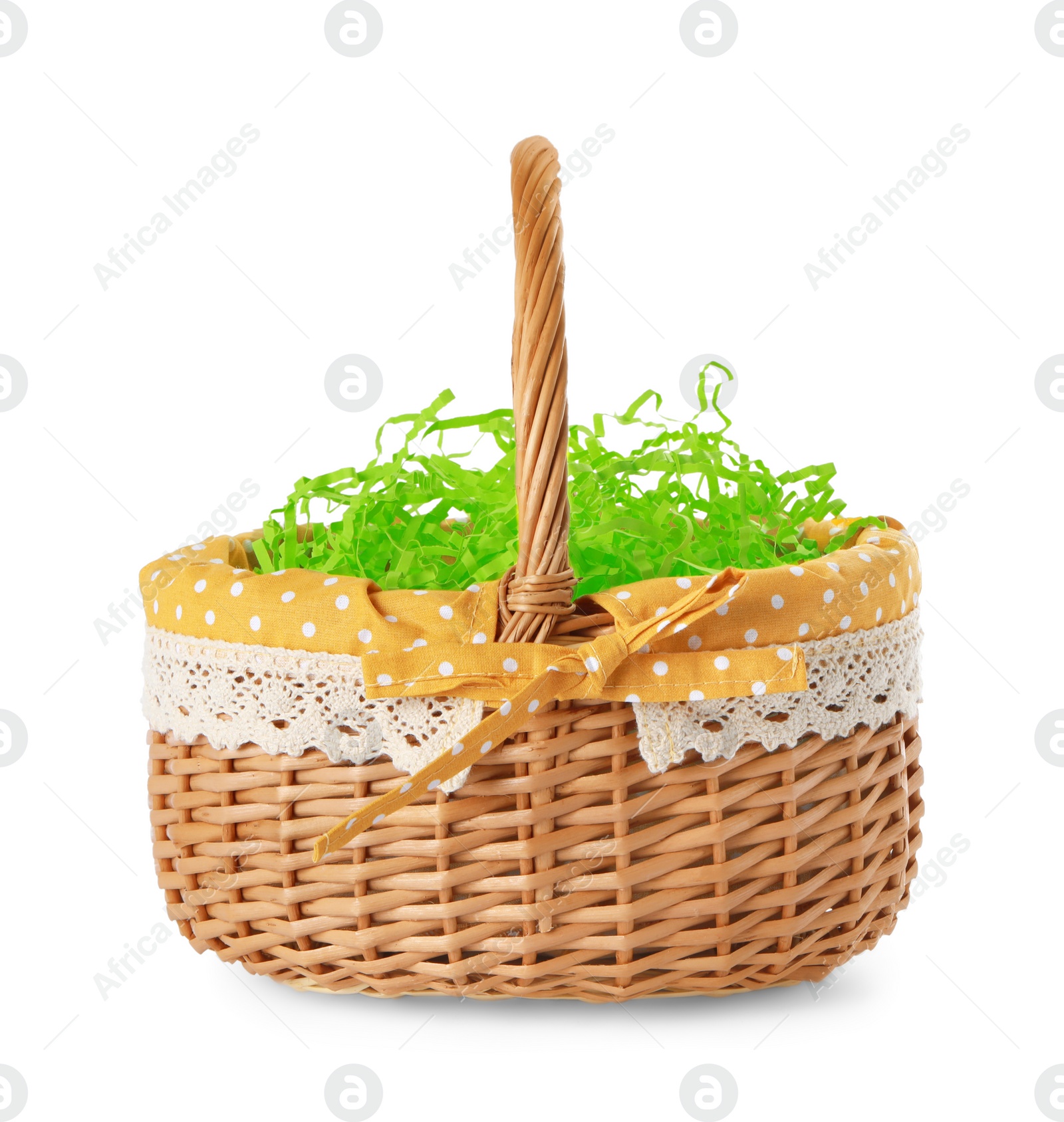 Photo of Easter wicker basket with decorated grass isolated on white