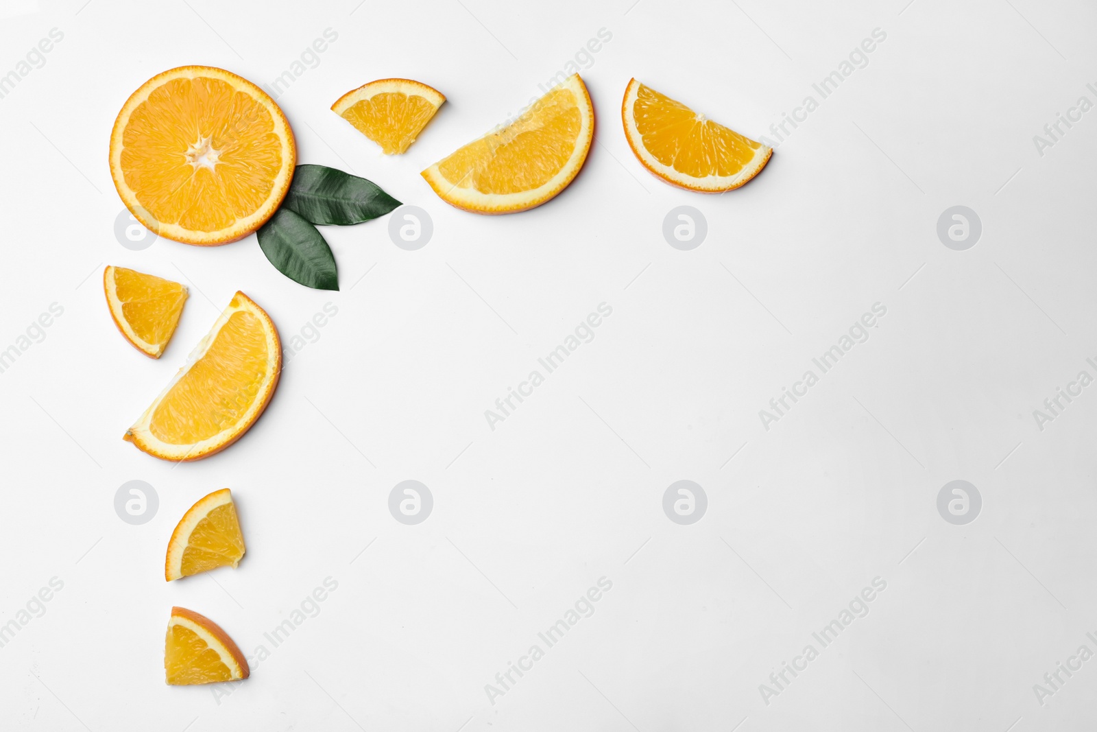 Photo of Frame made of fresh oranges on white background, top view