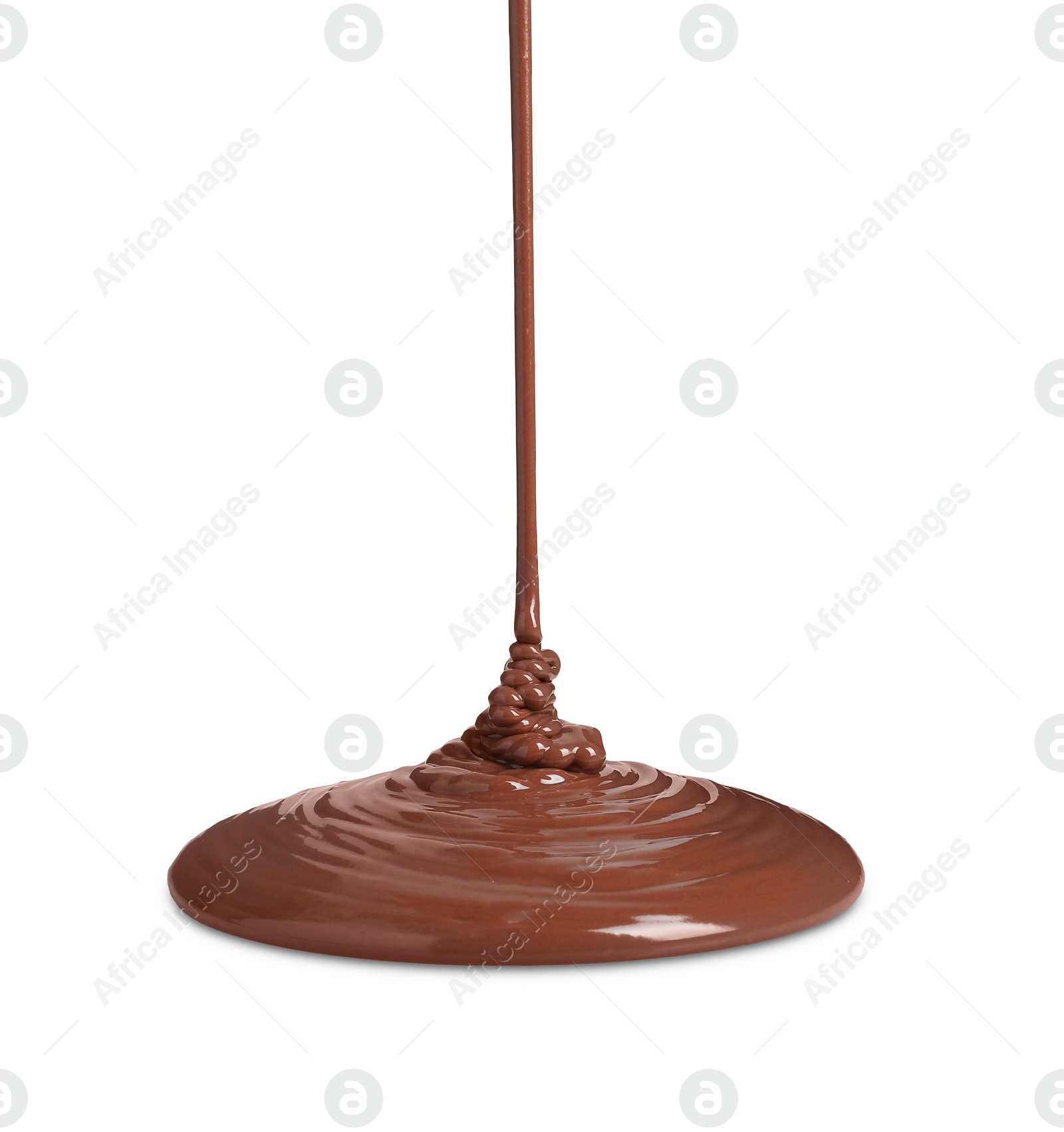 Photo of Pouring tasty melted milk chocolate isolated on white